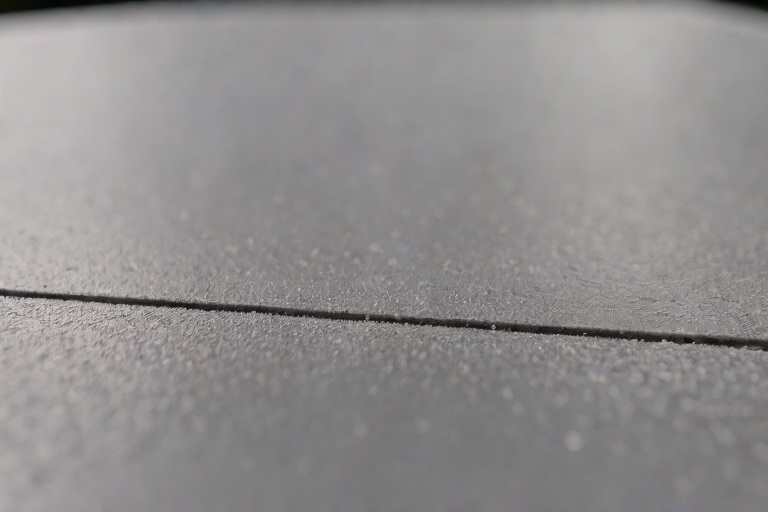 AOC 581 Elastomeric Structural Mastic Detailing Around Rooftop HVAC Curbs on Commercial Commercial Fleet Maintenance Hangars