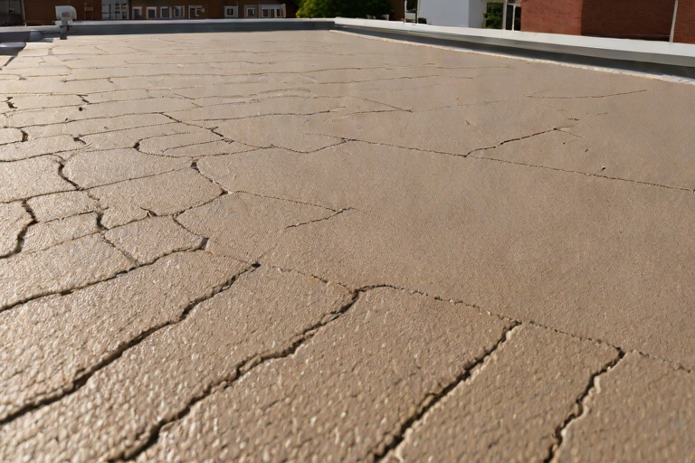 AOC 581 Elastomeric Structural Mastic Detailing Around Rooftop HVAC Curbs on Commercial Historic Sanctuary & Education Annexs
