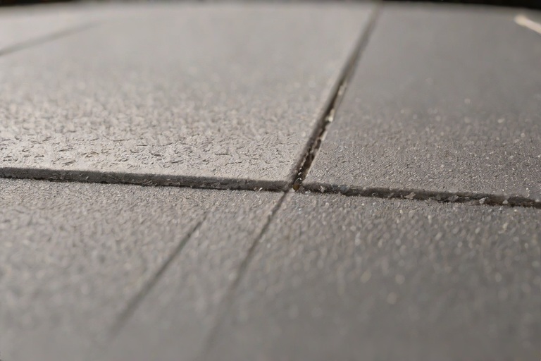 AOC 581 Elastomeric Structural Mastic Detailing Around Rooftop HVAC Curbs on Commercial Public Transit Maintenance Bus Barns
