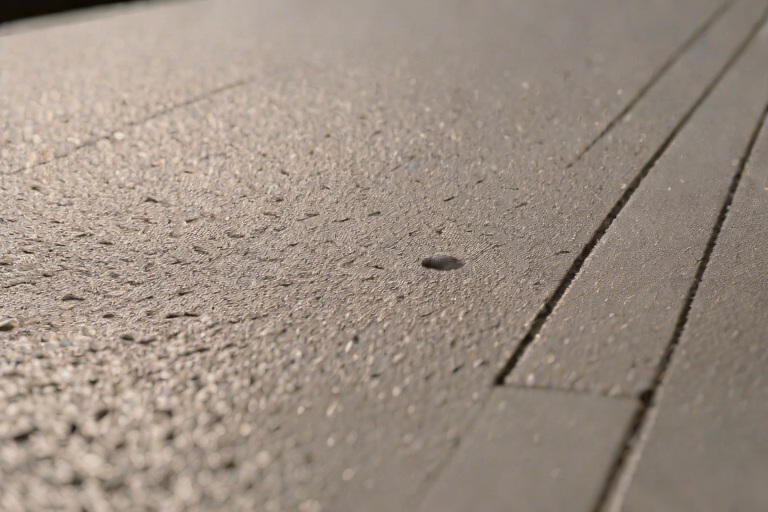 AOC 581 Elastomeric Structural Mastic Detailing Around Rooftop HVAC Curbs on Commercial Suburban Corporate Office Parks